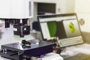 a microscope and a computer screen