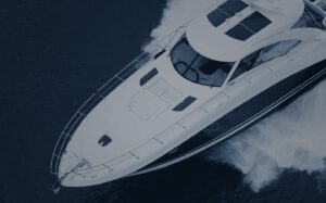 white boat cruising on water