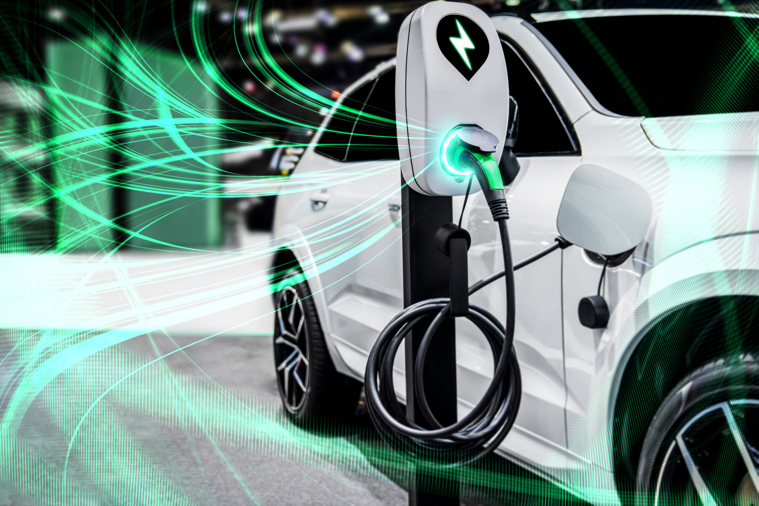 ev-charging-station-for-electric-car-in-concept-of-green-energy-and-eco-power-1348631007_3867x2579-scaled